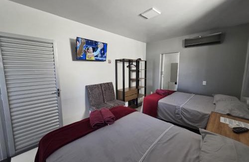 Goiania Villa | Suíte Privativa Climatizada Mobiliada com Garagem e Wi-Fi 3