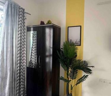 Koregaon Park Apartment | Sunflower Pvt Studio Room in Koregaon Park with AC WiFi Smart TV