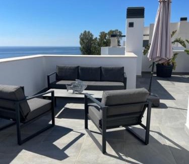 Velilla-Taramay Apartment | Sunny penthouse beach apartment with panoramic views