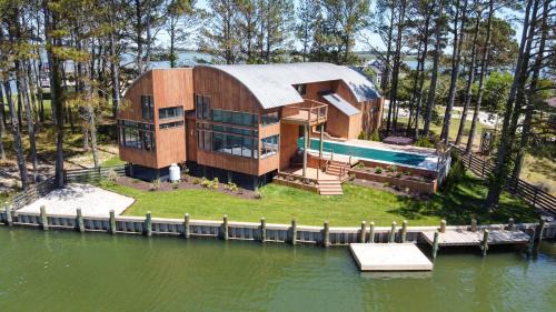 Deep Hole House | Sunrise Shore - Waterfront with private pool & hot tub!