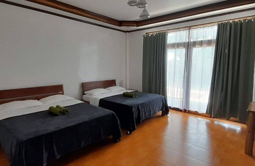 Catangnan Resort | Takbo Beach Resort - Cabana #3 - Two Queen Beds and amenities