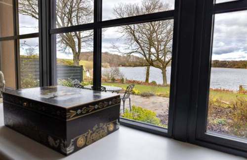 Wing House | Tarn End Cottage with view to Talkin Tarn, near Lake District