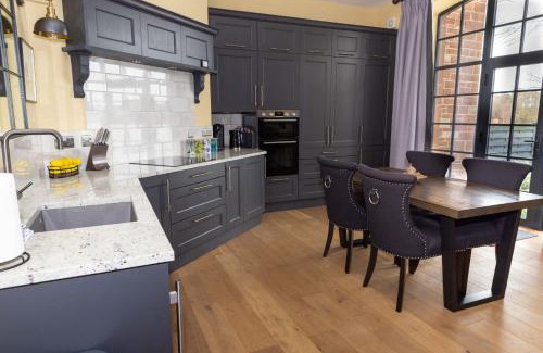 Wing House | Tarn End Cottage with view to Talkin Tarn, near Lake District