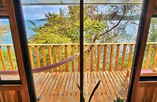 Lepanto House | Teak house in a forest above the beach