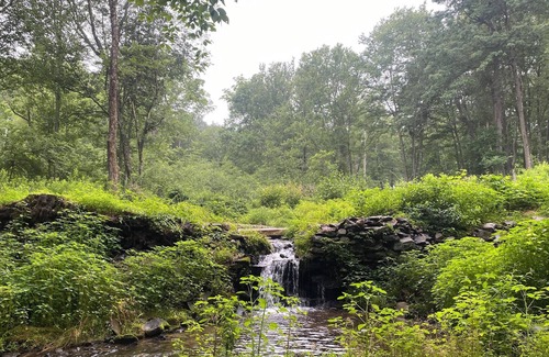 Mount Hope RV Rental | Tentrr Signature Site - Lake Hills Farm - Stream Side Camping