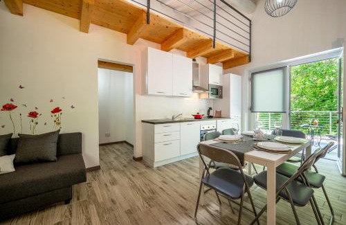 Montemezzo Apartment | Tenuta il Sogno Ferienwohnung Bianco