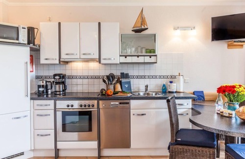 Kronsgaard Apartment | Terrassen-Fewo "Heimathaven" direkt am Ostseestrand