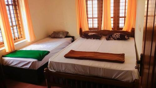 Thiruvananthapuram Apartment | Texas guest house 4 bed Rooms