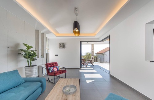 Smrika House | The attractive semi-detached house, which consists of two floors, is located on a hill far from the