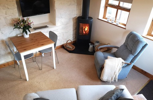 Rhosybol Cottage | THE BYRE, character holiday cottage, with open fire in Dulas