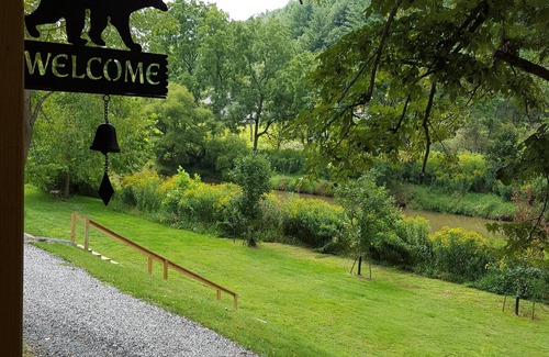 Lansing Cabin | The Cabin- Riverside Cabin Perfect For Your Family Getaway.or romantic getaway