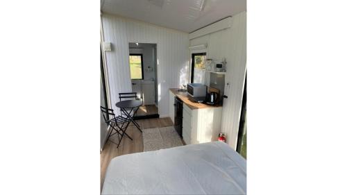 Waimangaroa House | The Coast 2 by Tiny Away
