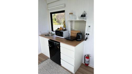 Waimangaroa House | The Coast 2 by Tiny Away