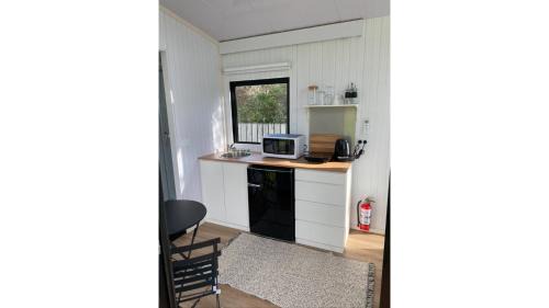Waimangaroa House | The Coast 2 by Tiny Away