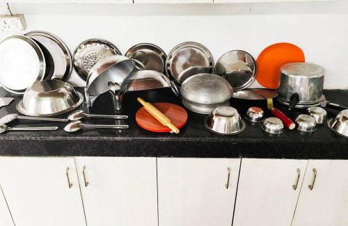 Sualkuchi House | The Golden Nest Cottage - Two Bedrooms with King size Beds and a private open kitchen - Non-AC, kitchen uses 200 per night