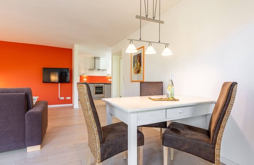 Wyk auf Foehr Apartment | The location is heavenly quiet on the outskirts of the city, surrounded by green trees.
