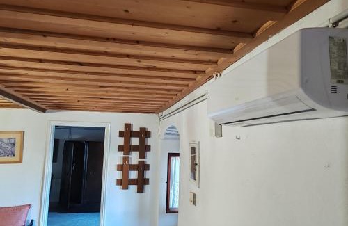 Evreti House | The Old House - Wood & Stone