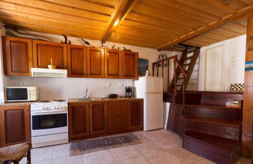 Evreti House | The Old House - Wood & Stone