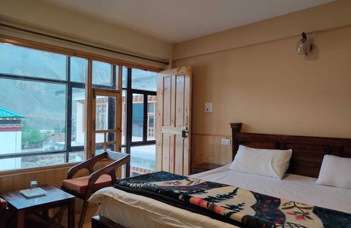 Kaza Hotel | The old monk