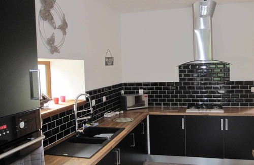 Canihuel House | The Old Stables with shared heated pool for 8 people with views over the lake