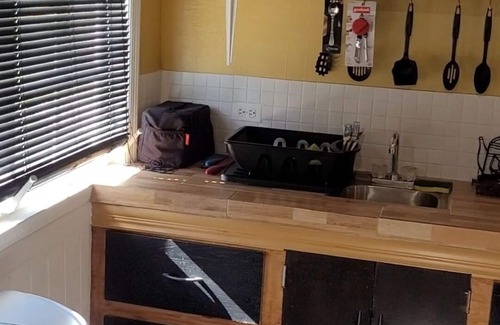 Jimmy Hill House | The Phoenix comfort sunset Guest suite