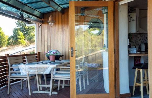 Cygnet House | The Roundhouses. Strawbale luxury accommodation on a small hobby farm.