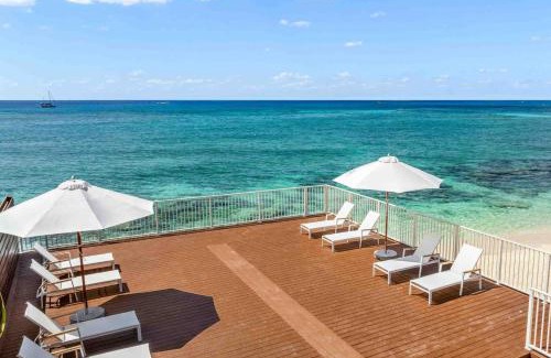 West Bay Apartment | The Sands #1 - New 7Mile Beach Condo with Rooftop Pool & Luxe Interiors