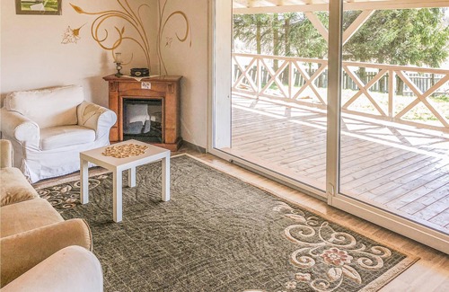 Mirsk House | This attractive and comfortable vacation home with a beautiful view of the mountains and the forest