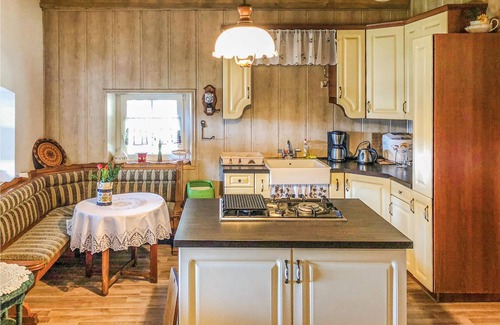 Mirsk House | This attractive and comfortable vacation home with a beautiful view of the mountains and the forest