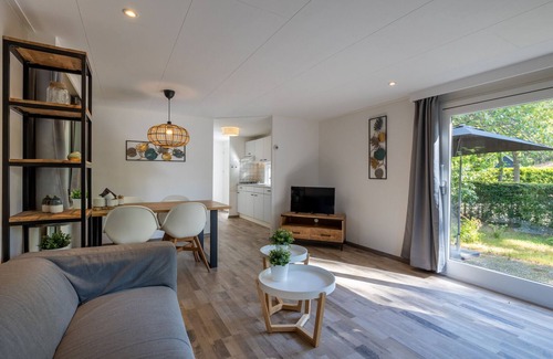 Municipality of Harderwijk House | This Tiny Lodge (48 m²) is suited for 2 to 3 people (2 adults and 1 child), equipped with a garden and terrace.