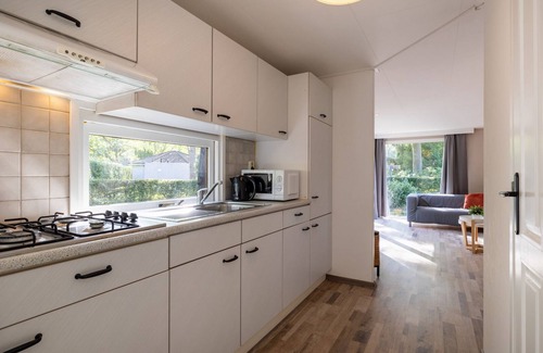 Municipality of Harderwijk House | This Tiny Lodge (48 m²) is suited for 2 to 3 people (2 adults and 1 child), equipped with a garden and terrace.