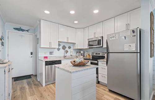 Alabama Gulf Coast Condo | Time to get… 🎶 Knee deep in the water somewhere! 🎶 on island time!