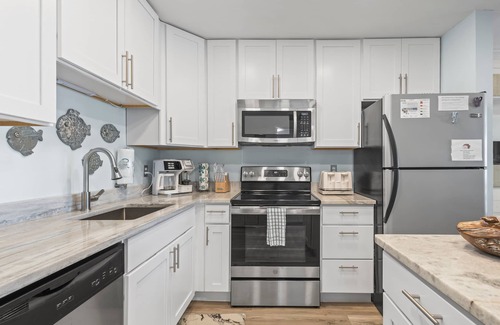 Alabama Gulf Coast Condo | Time to get… 🎶 Knee deep in the water somewhere! 🎶 on island time!