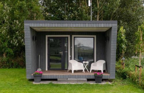 Wommels House | Tiny house aan het water op de appelhof
