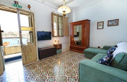 Marsaskala House | Traditional Maltese Townhouse with Backyard Garden and Seafront Location