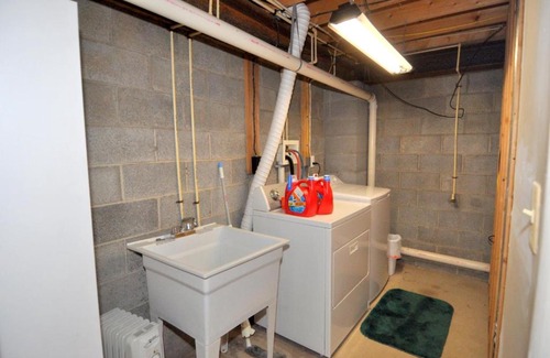 Great Cacapon Ski Chalet | Trails End River Retreat - River Access - Pet Friendly - Hot Tub - Grill - Wifi - Fire Pit - Deck - Screen Porch - Family Friendly - Fishing - King Bed - Wood Stove