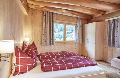 Oetz Cabin | Tree trunk house with very large living and leisure area on approx. 240m2 living space!