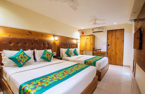 Grant Road Hotel | Treebo Anam International