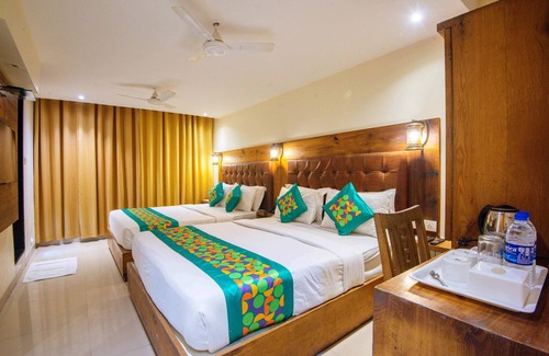 Grant Road Hotel | Treebo Anam International