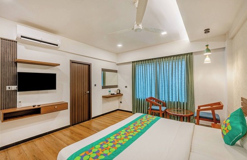 Thampanoor Hotel | Treebo De Cloud 9 Regency