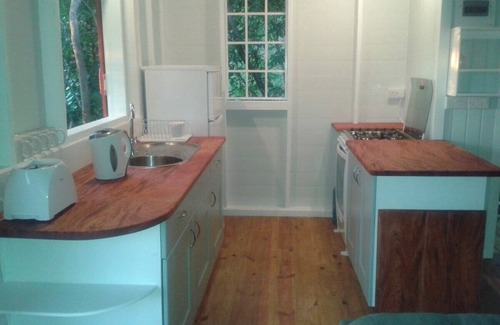 Toucari Cottage | Treetops. A beautiful timber cottage, sea view, private and close to the beach.