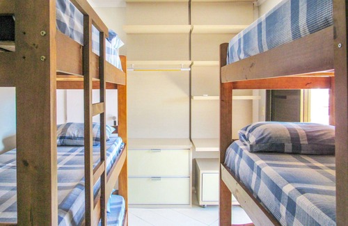 Tombo Apartment | Triplex a 260m da Praia das Astúrias - Guarujá/SP