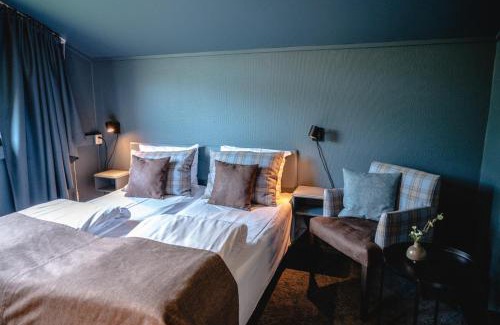 Dombas Hotel | Trolltun Hotel & Hytter