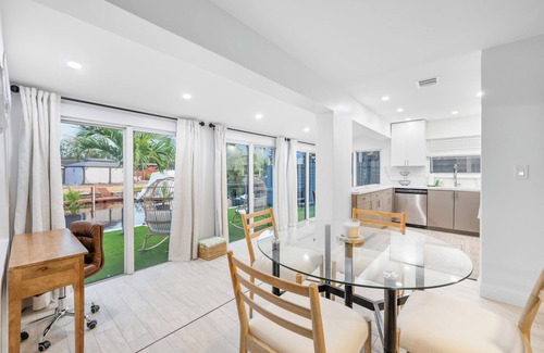 Melaleuca Gardens Apartment | Tropical Waterfront Oasis with Hot Tub Jacuzzi