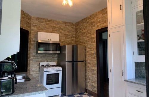St. Charles Apartment | Tudor house stay-In Town Location!