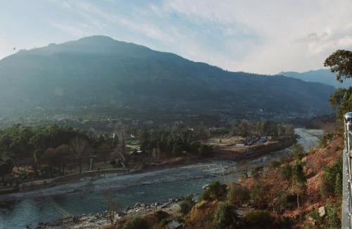 Mohal Hotel | Tulip Flowing River View Hotel.