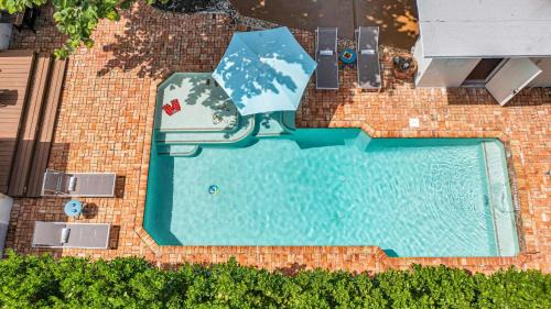 Lauderdale Beach House | TWO houses ONE Property Game Room Heated Pool 2 Hot Tubs STEPS from Beach RESlDENCES