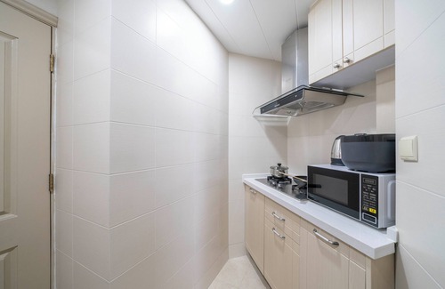 Changning Bed & Breakfast | Tyms 1BR APT Gubei International Garden