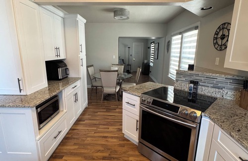 Milwaukee House | Updated 2BR, 2.5BA. Hot tub, fenced in yard, modern updates.