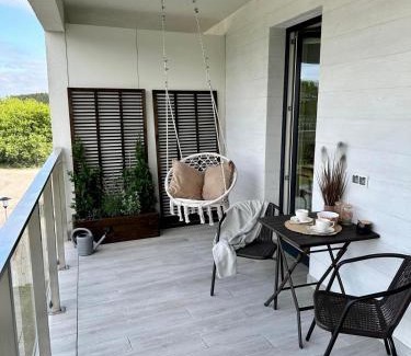 Augustow Apartment | Urokliwy Apartament z dużym tarasem i widokiem na Jezioro Białe